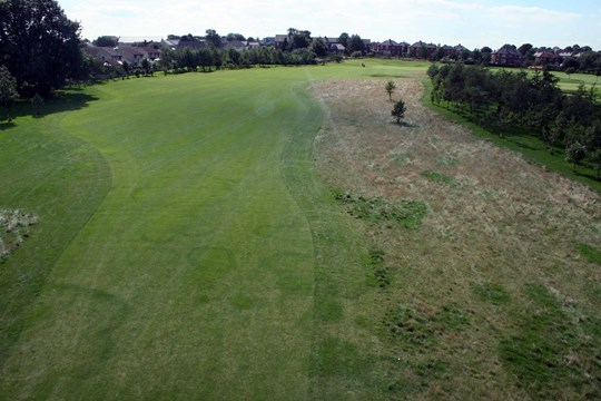 Looking down the fairway on the 16th hole from above.