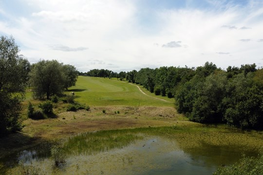 view from 9th tee across lake