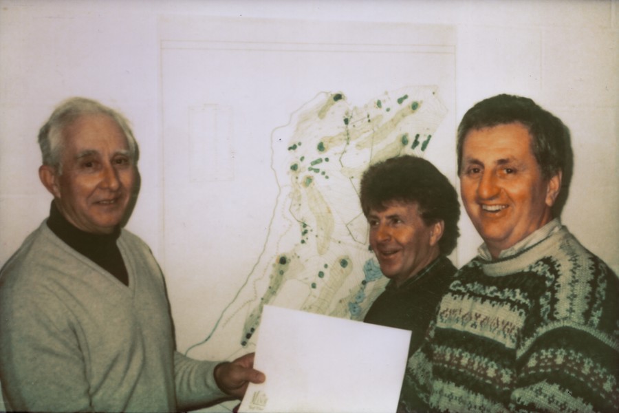 Bill and Eric Cook being presented with the deed of debenture.