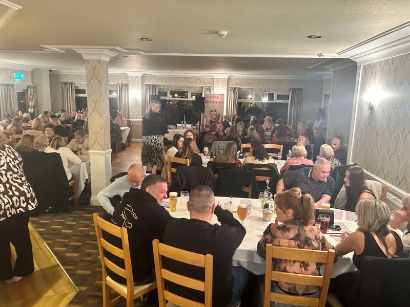 People seated at tables for Drag Bingo at The Manor Leeds.