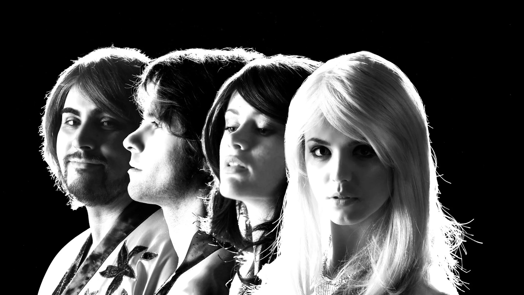 A black and white photo of ABBA tribute act Planet ABBA.