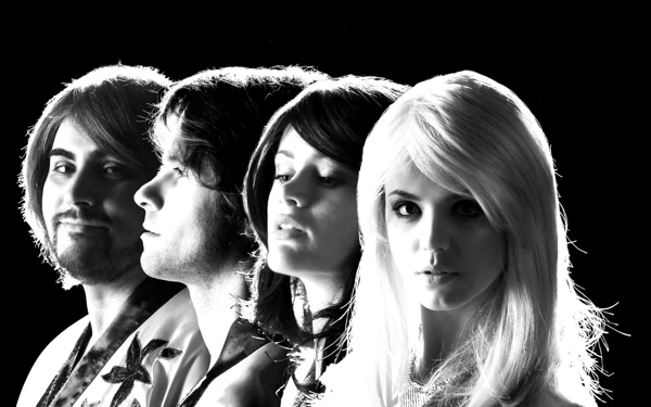 A black and white photo of ABBA tribute act Planet ABBA.