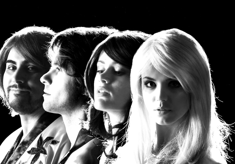 A black and white photo of ABBA tribute act Planet ABBA.