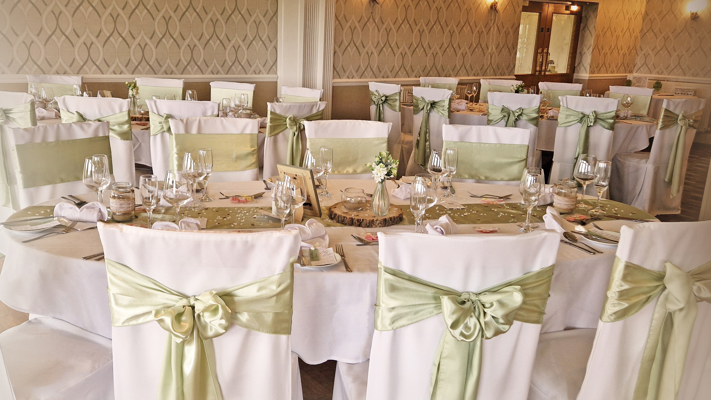 Dining tables in The View at The Manor set for a wedding breakfast.