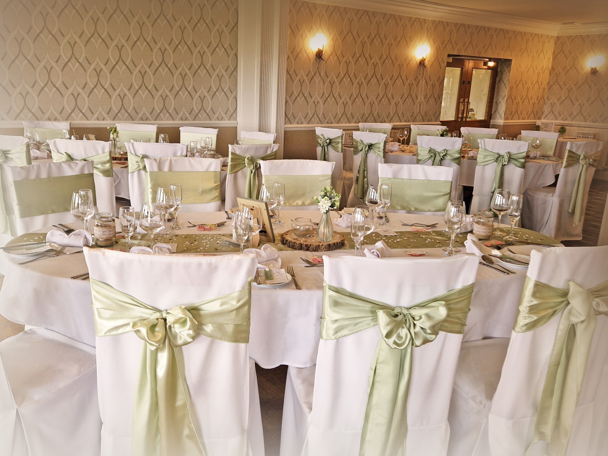Dining tables in The View at The Manor set for a wedding breakfast.