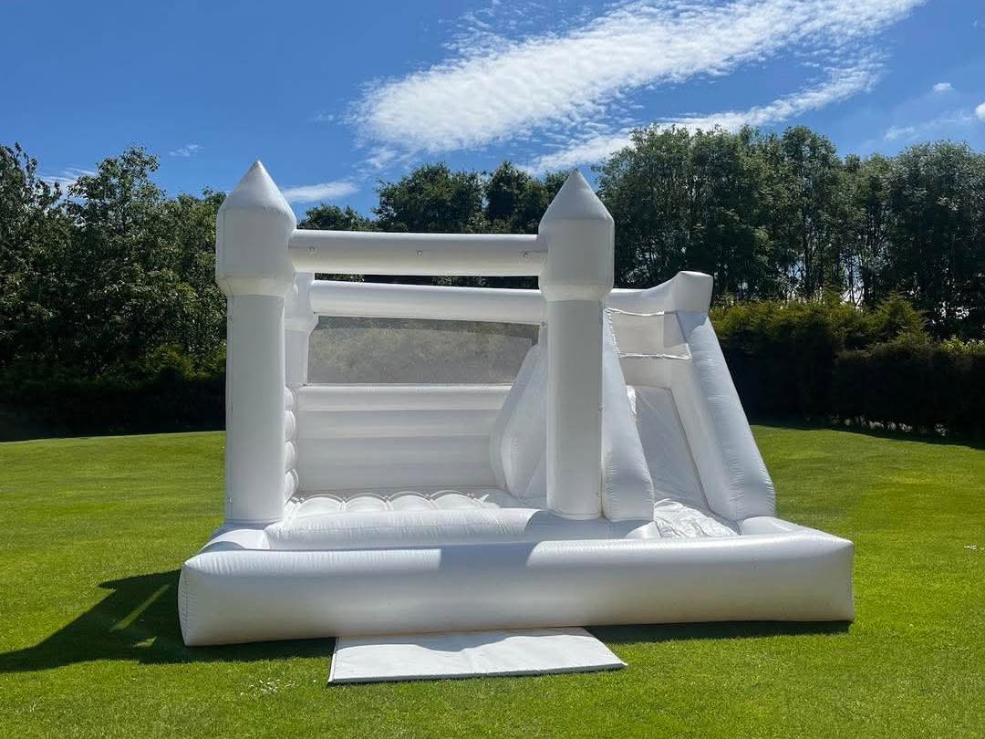 A white bouncy castle on The Lawn at The Manor Leeds.